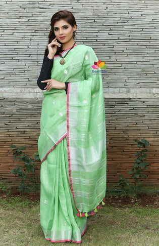  Green linen embroided saree